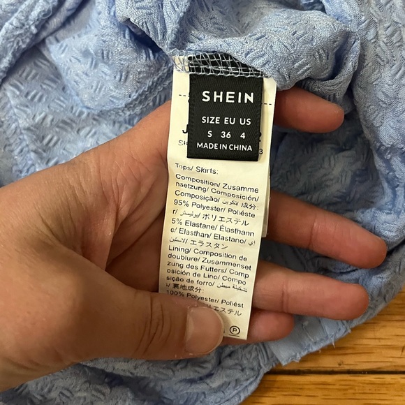 Light blue mini skirt and corset top set - Picture 9 of 10